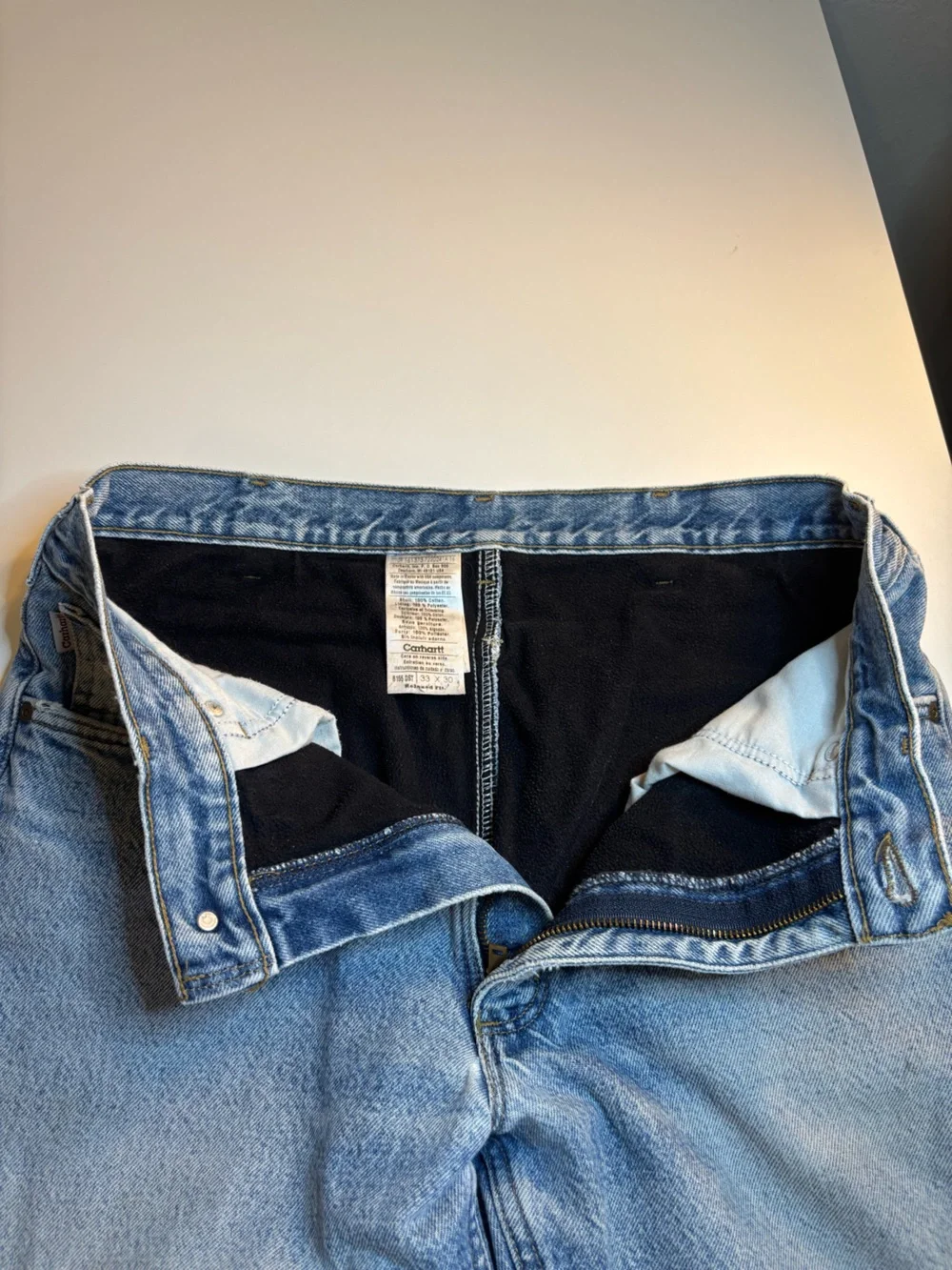 Carhartt blue denim insulated jeans.